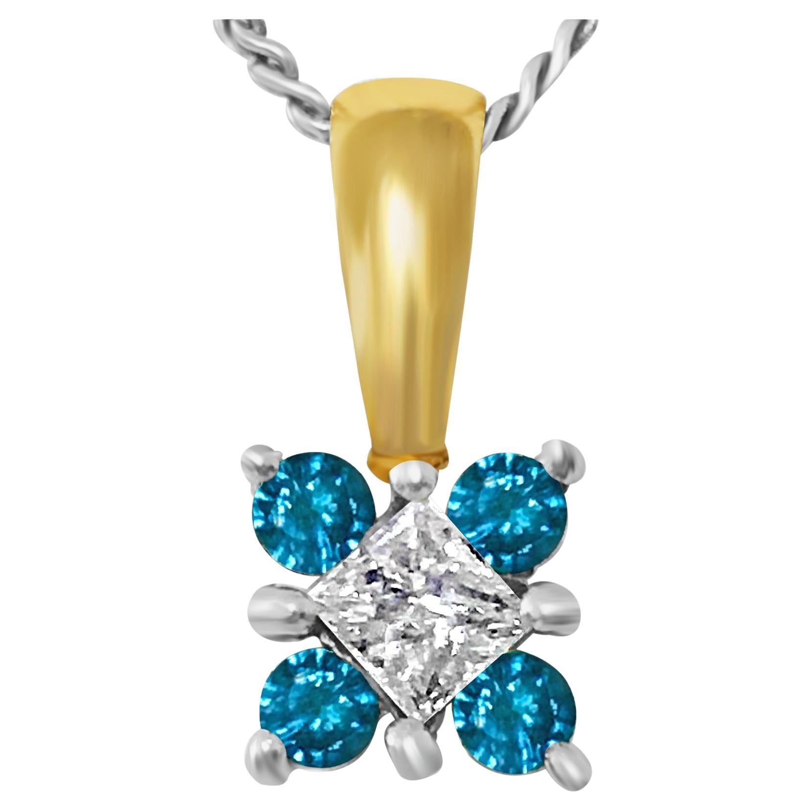 Pendentif en or 14 carats avec diamants de 0,60 carat et diamant bleu.