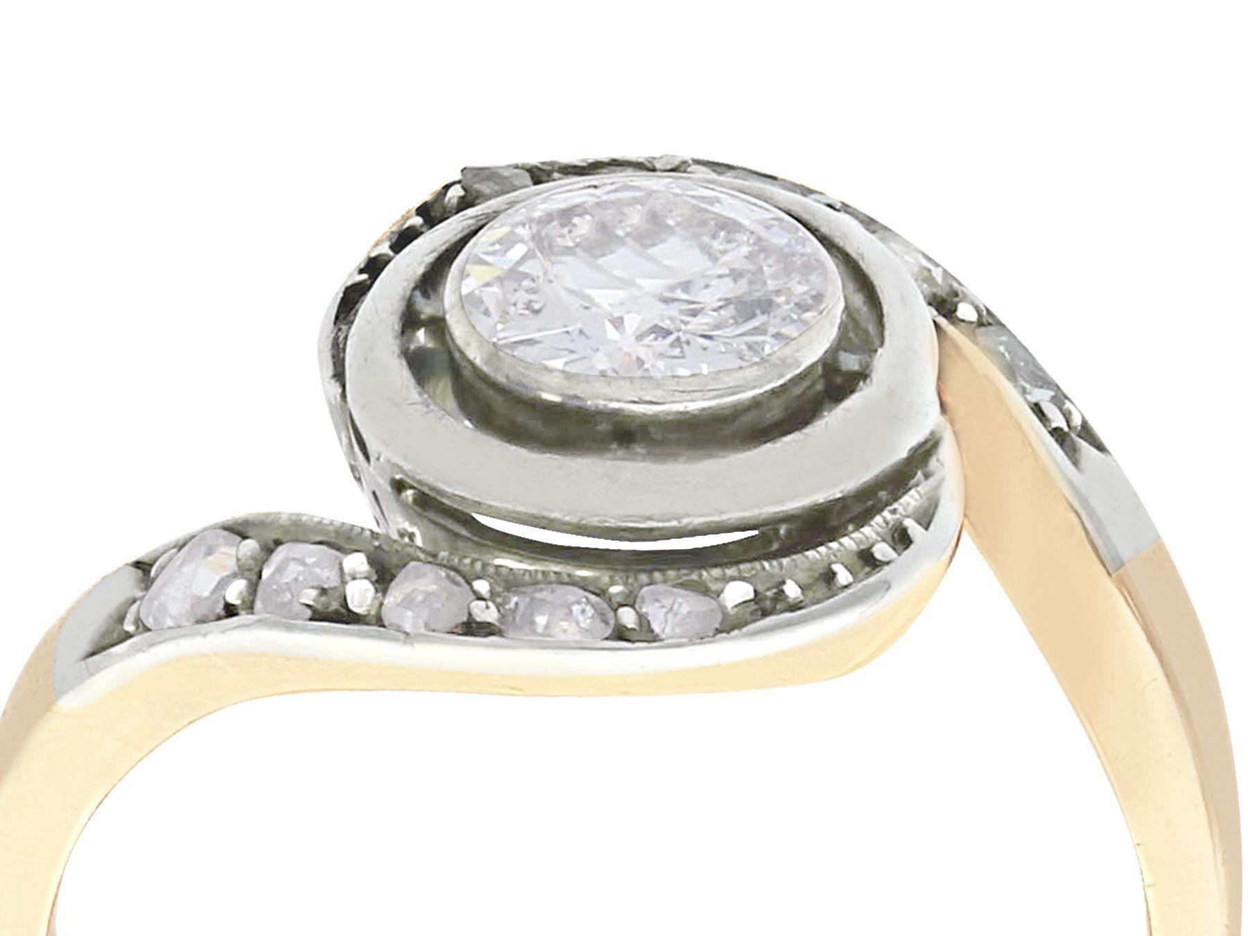 A fine and impressive 0.60 carat diamond and 18 karat yellow gold, platinum and silver set twist ring; part of our antique jewelry and estate jewelry collections.

This impressive antique twist ring has been crafted in 18k yellow gold with platinum