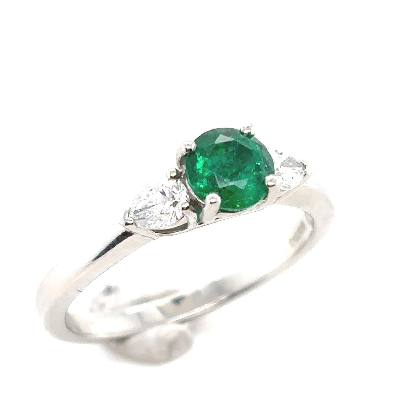 0.60 Carat Emerald and Diamond Three Stone Platinum Engagement Ring For Sale 3