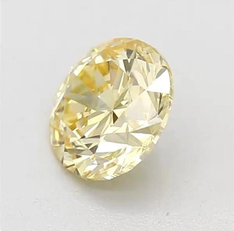 Round Cut 0.60 Carat Fancy Yellow Round cut diamond SI1 Clarity GIA Certified For Sale