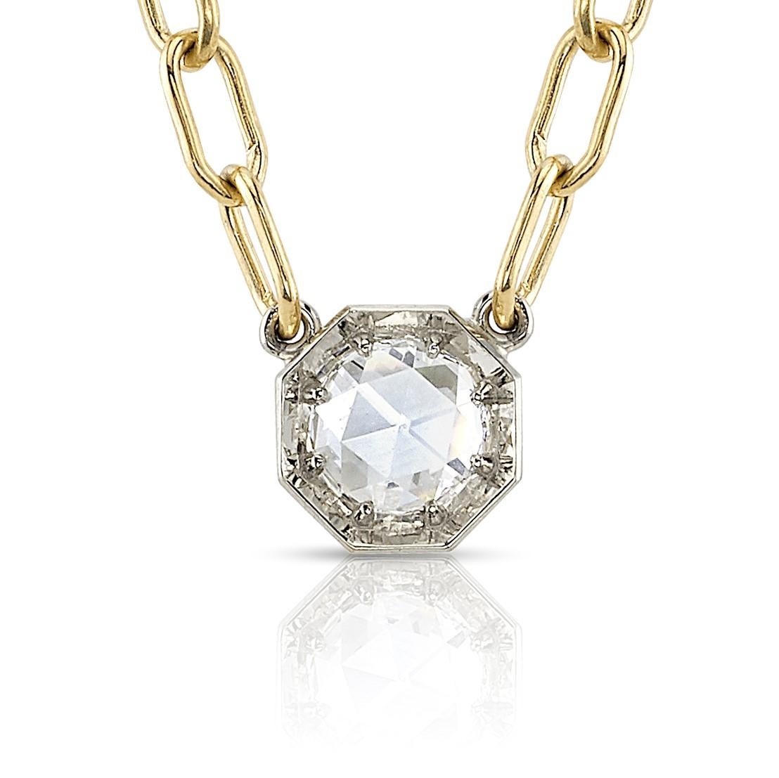0.60ctw F/VS1 GIA certified Rose cut diamond set in a handcrafted 18K champagne gold pendant. Pendant is set on a handcrafted 18K yellow gold bond chain.

Chain measures 17