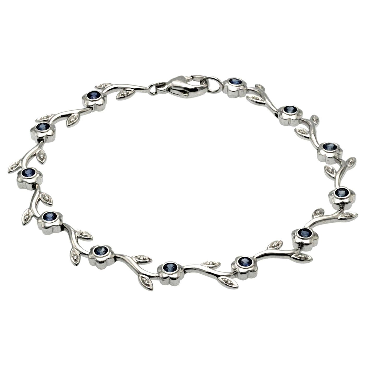 0.60 Carat Natural Blue Sapphire & 0.12 Carat Diamonds 14K Gold Flower Bracelet For Sale