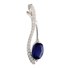 0.60 Carat Natural Blue Sapphire and Diamond Set in Solid White Gold Pendant
