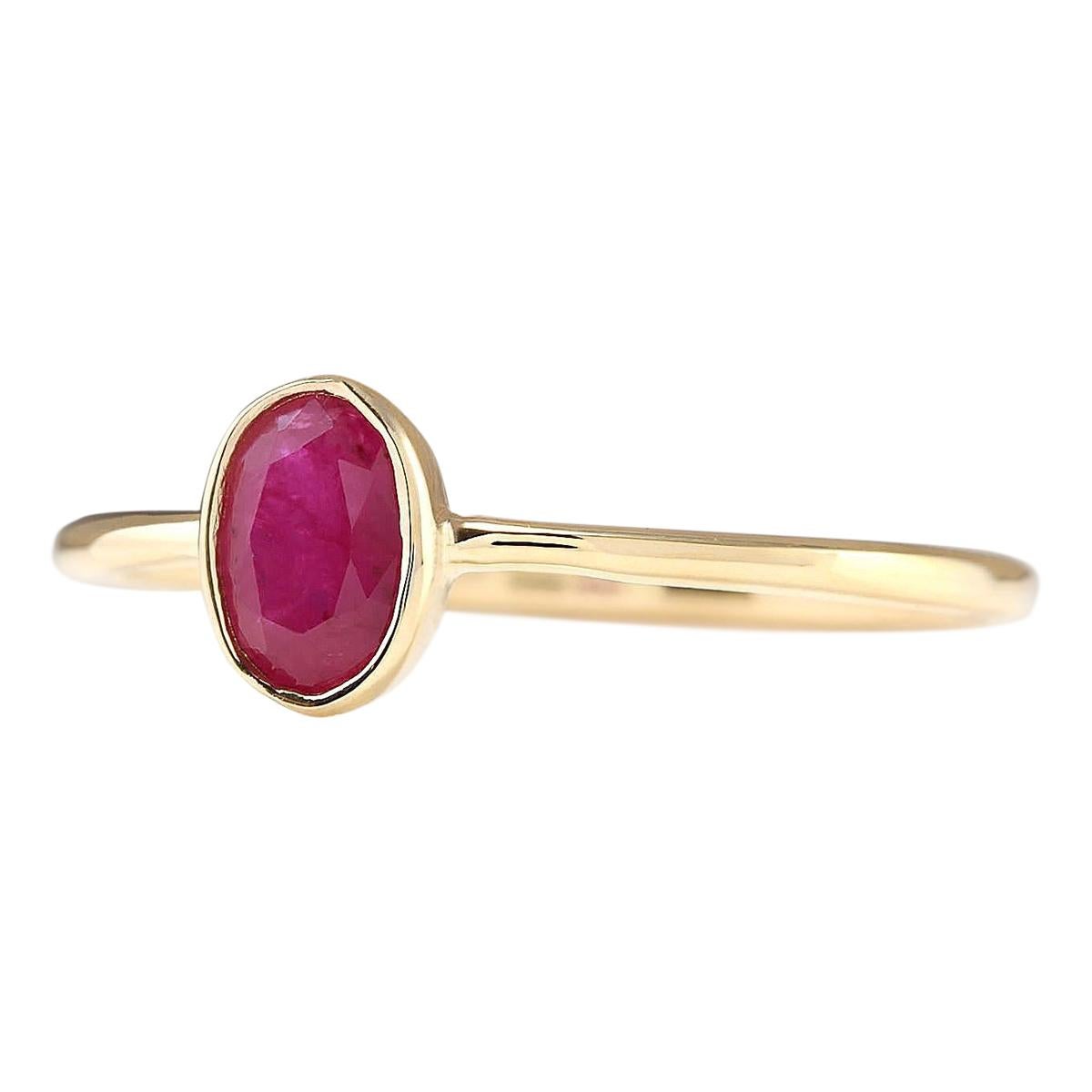 Presenting our enchanting 14 Karat Yellow Gold Ring adorned with a stunning 0.60 Carat Natural Ruby gemstone. Impeccably crafted and stamped for authenticity in 14K yellow gold, this ring exudes elegance and charm. Weighing only 1.3 grams, it offers
