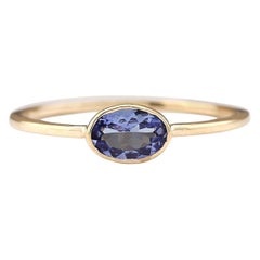0.60 Carat Natural Tanzanite 14 Karat Yellow Gold Ring