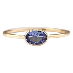 0.60 Carat Natural Tanzanite 14 Karat Yellow Gold Ring