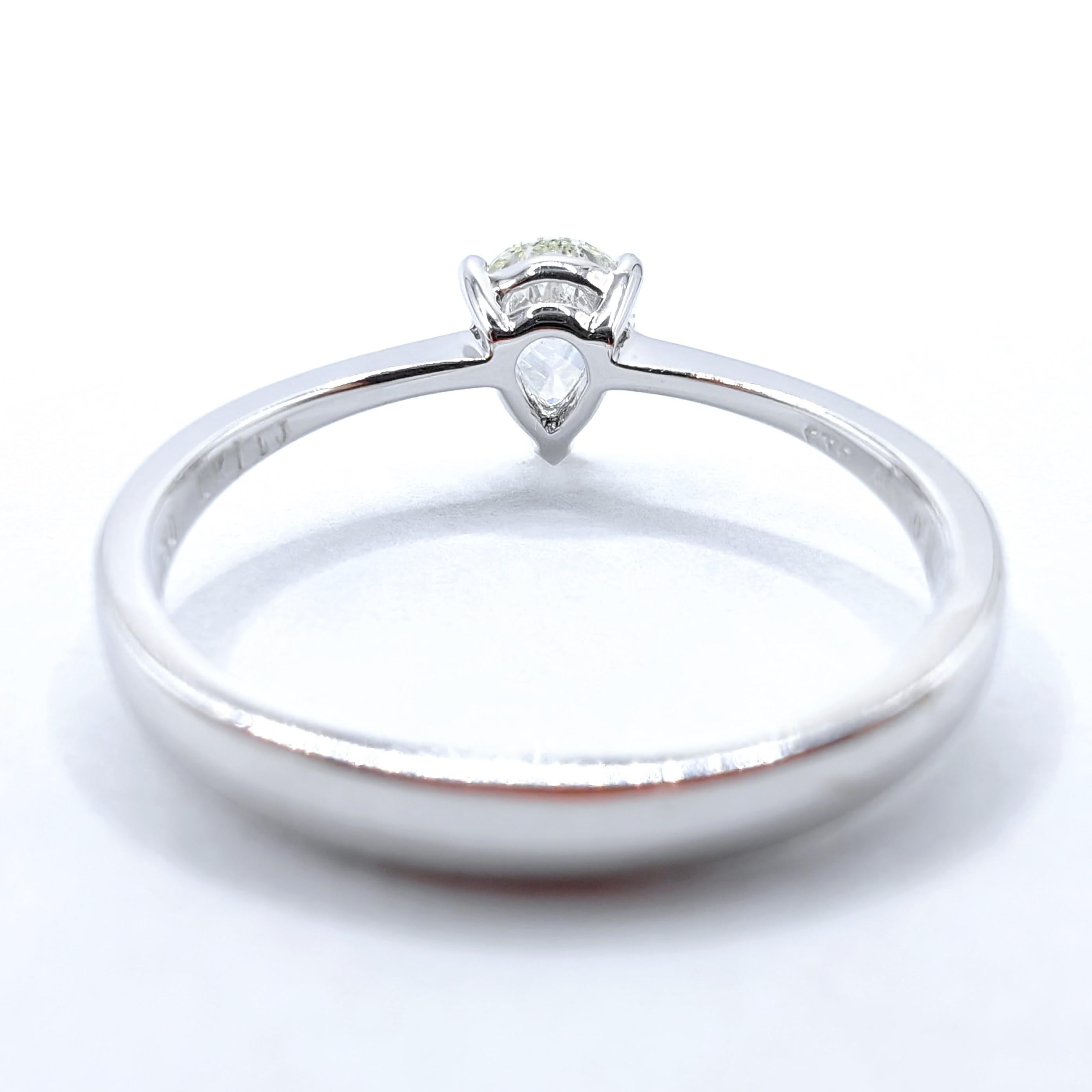 Refined and timeless, this 0.60 Carat pear-cut diamond solitaire ring in 18k White Gold is a symbol of grace and sophistication. The pear-cut diamond’s brilliant facets enhance its sparkle, offering a captivating balance of fire and brilliance. Set