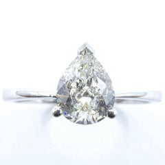 0.60 Carat Pear-cut Natural Diamond Classic Solitaire Ring in 18k White Gold