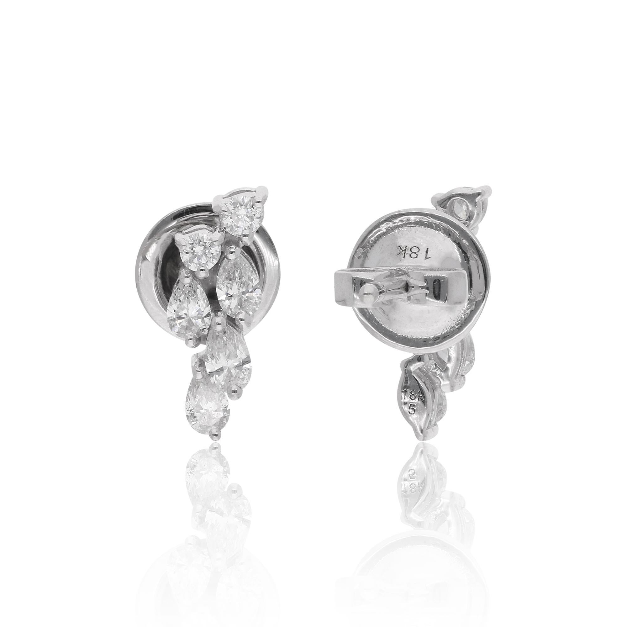 Indulge in the timeless elegance of these exquisite 0.60 Carat Pear & Round Diamond Earrings, crafted with meticulous attention to detail in 18 Karat White Gold. These captivating earrings are a testament to the artistry and sophistication of