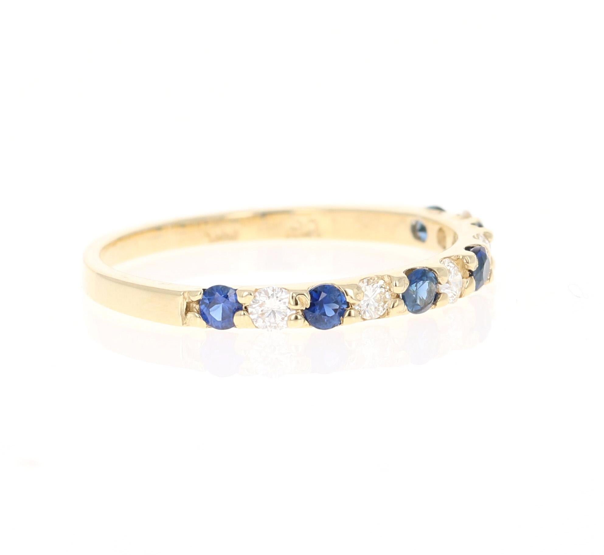 This ring has 6 Blue Sapphires that weigh 0.37 Carats and 5 Round Cut Diamonds that weigh 0.23 Carats. The clarity and color of the diamonds are VS-H. The total carat weight of the ring is 0.60 Carats. 

Crafted in 14 Karat Yellow Gold and is