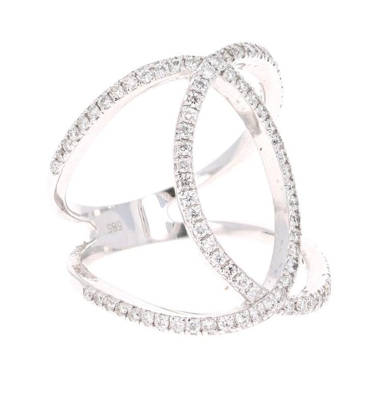 Statement ring for the modern boss babe! 

This ring has 86 Round Cut Diamonds that weigh 0.60 Carats. The clarity and color of the diamonds are VS-H.

Crafted in 14 Karat White Gold and is approximately 4.6 grams 

The ring is a size 6 3/4 and can
