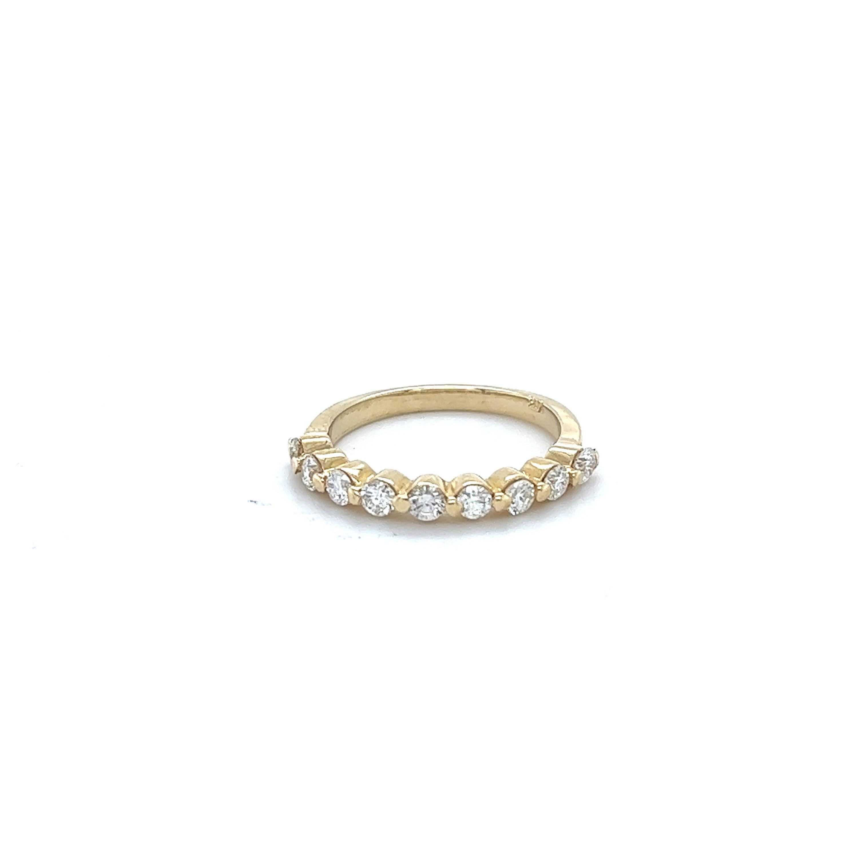 A beautiful band that can be worn as a single band or stack with other bands in other colors of Gold

This ring has 9 Round Cut Diamonds that weigh 0.60 Carats. The clarity and color of the diamonds are SI1-H.

Crafted in 14 Karat Yellow Gold and