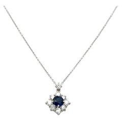 0.60 Carat Round Diamond 0.56 Carat Sapphire 18K White Gold Pendant Necklace