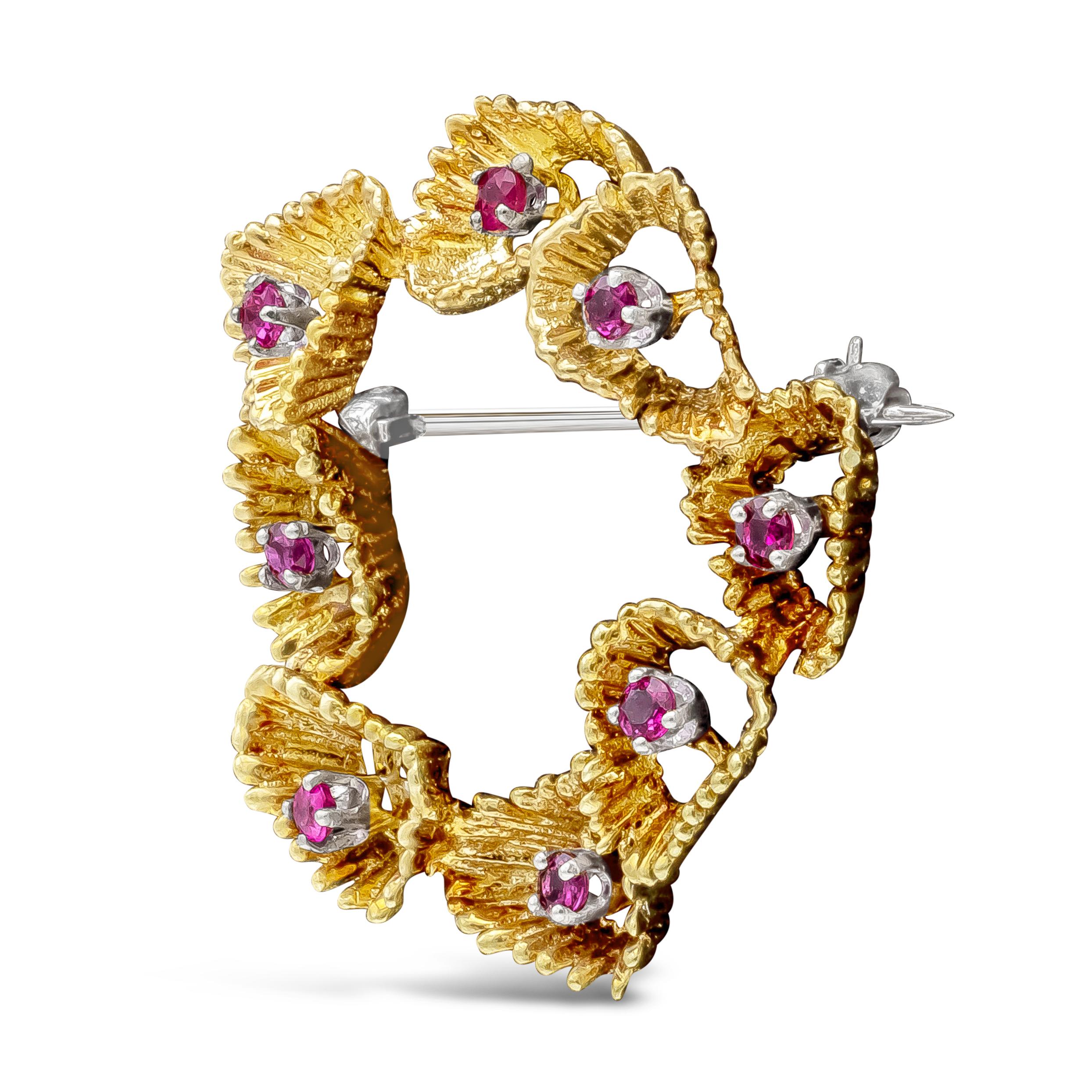 A unique and well-crafted brooch in a coral reef design, Accented with round cut rubbies weighing 0.60 carats total. made with 18K Yellow Gold