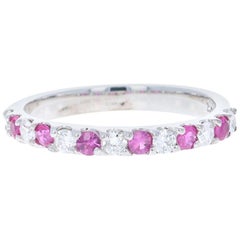0.60 Carat Ruby and Diamond 14 Karat White Gold Band