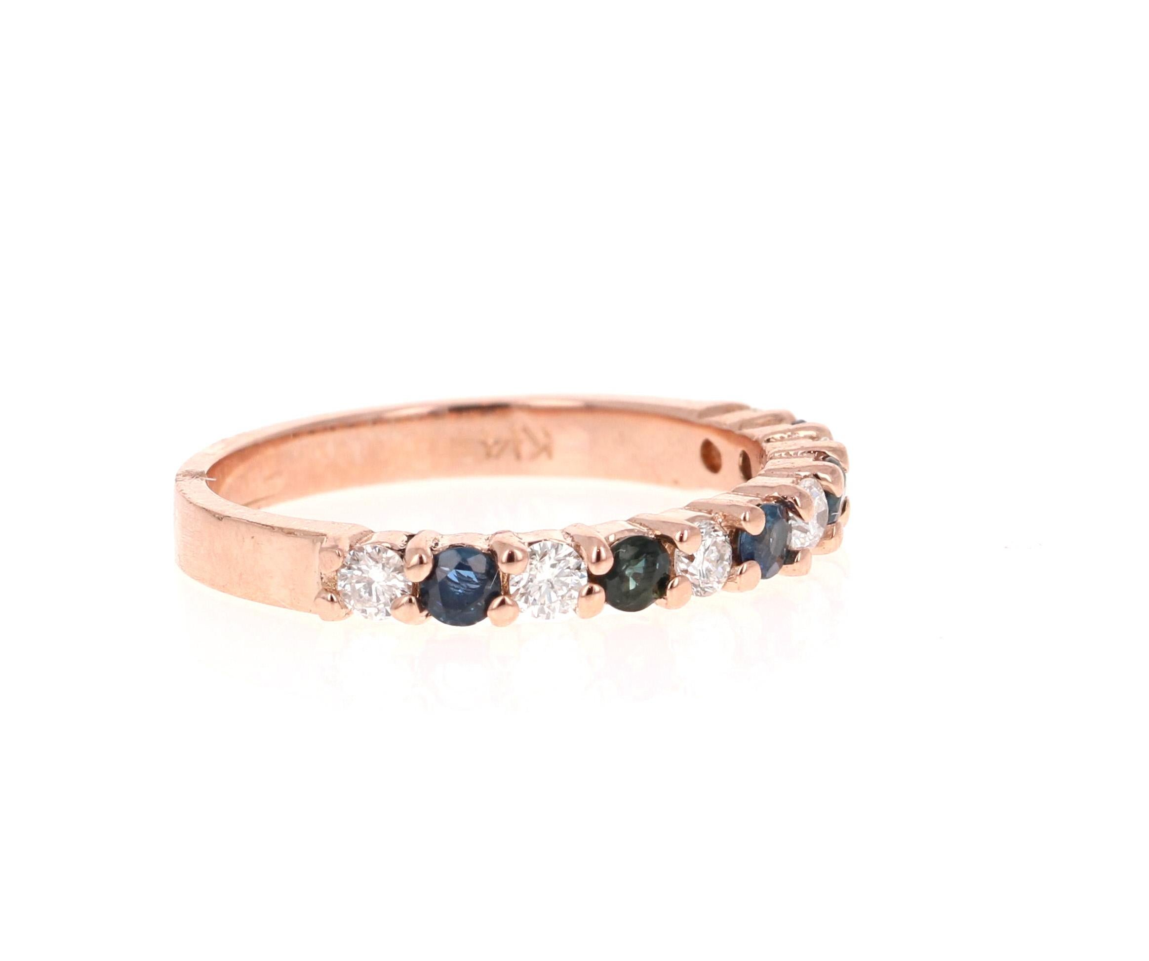 0.60 Carat Sapphire and Diamond 14K Rose Gold Band.

This is a classic band that is a must-have!
It has 5 Sapphires that weigh 0.32 Carats and 6 Round Cut Diamonds that weigh 0.28 Carats. (Clarity: SI, Color: F) The Total Carat Weight of the Band is