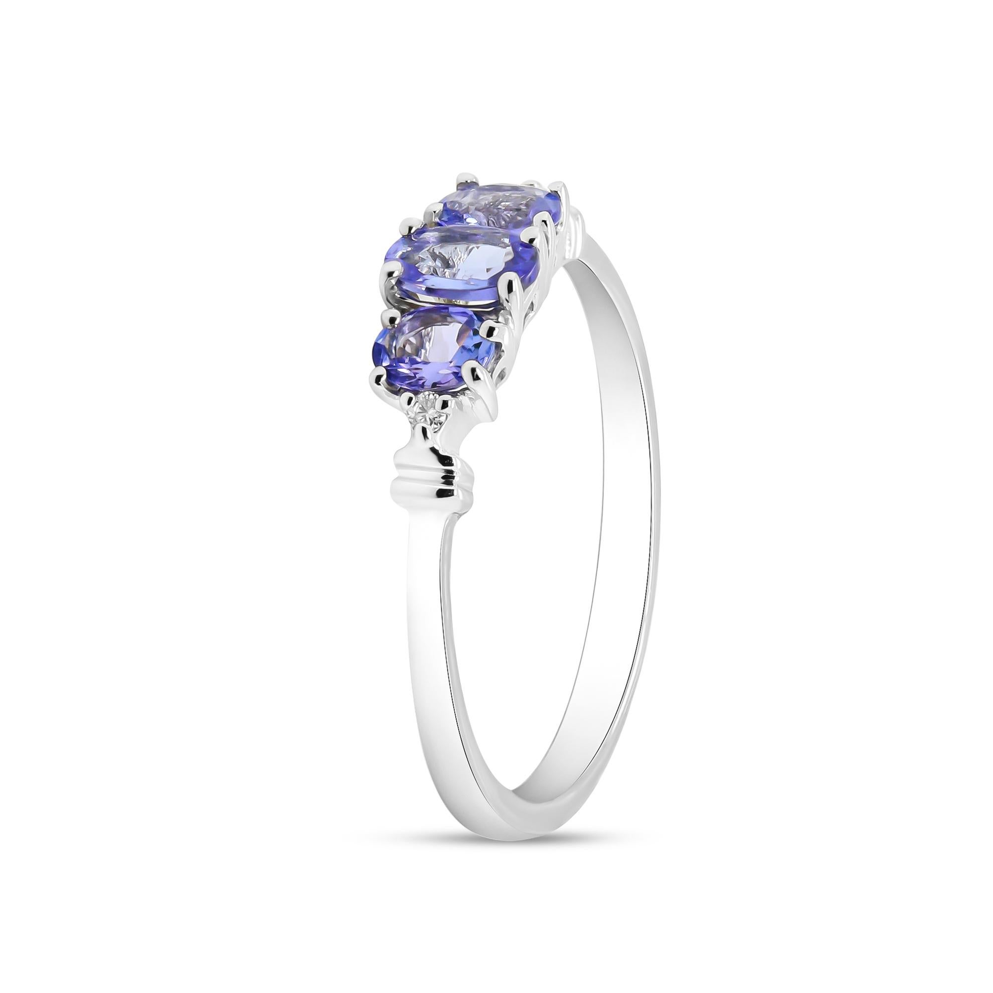 Art Deco 0.60 Carat Tanzanite Oval Cut and Diamond 10K White Gold Bridal Ring For Sale