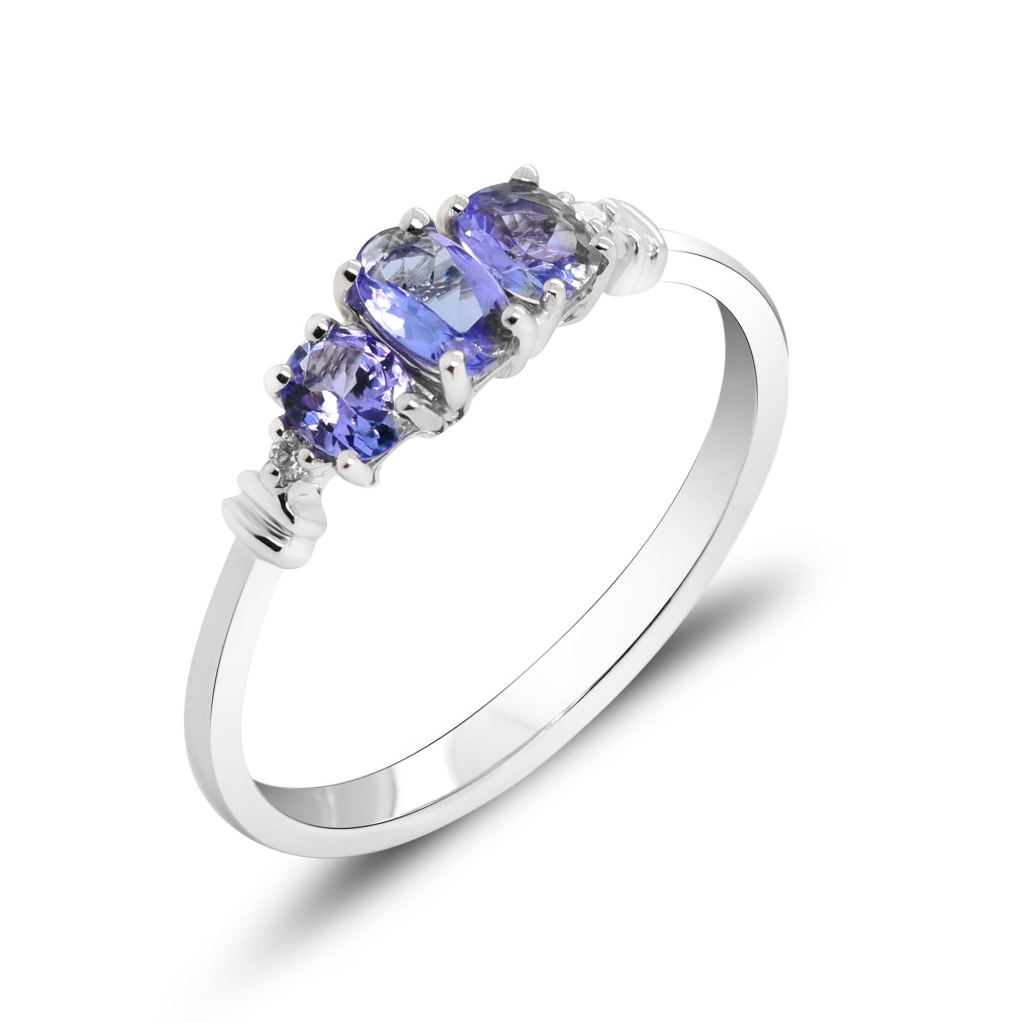 Women's 0.60 Carat Tanzanite Oval Cut and Diamond 10K White Gold Bridal Ring For Sale