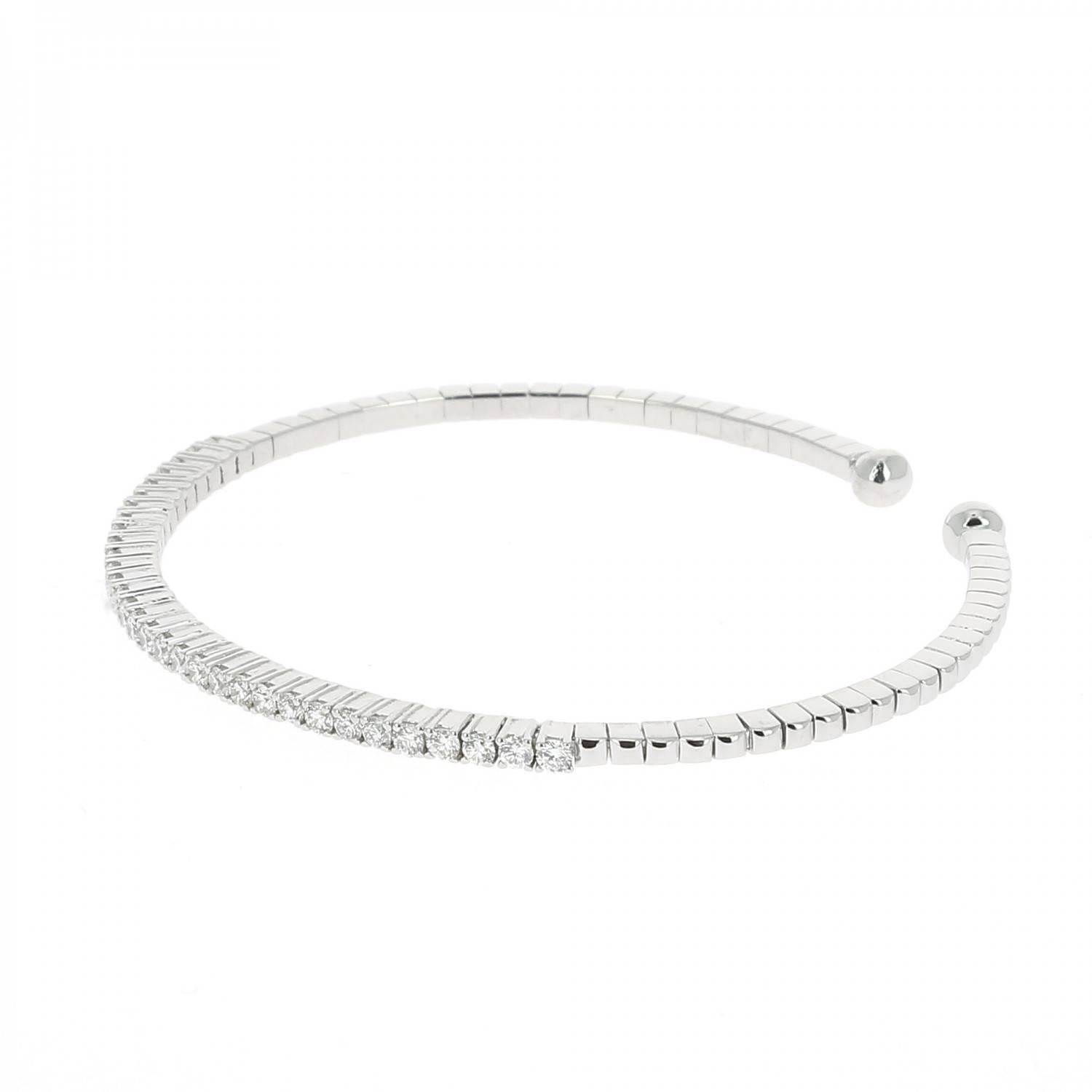 Beautiful And Modern Tennis Bracelet.
The new style tennis Bracelet is set with 0.60 Carats Round Diamonds.
There are 40 Round White Diamonds.
The Bracelet is 5.5 cm.
The Diamond Bracelet is in 18K White Gold.
The Bracelet is also available in 18K