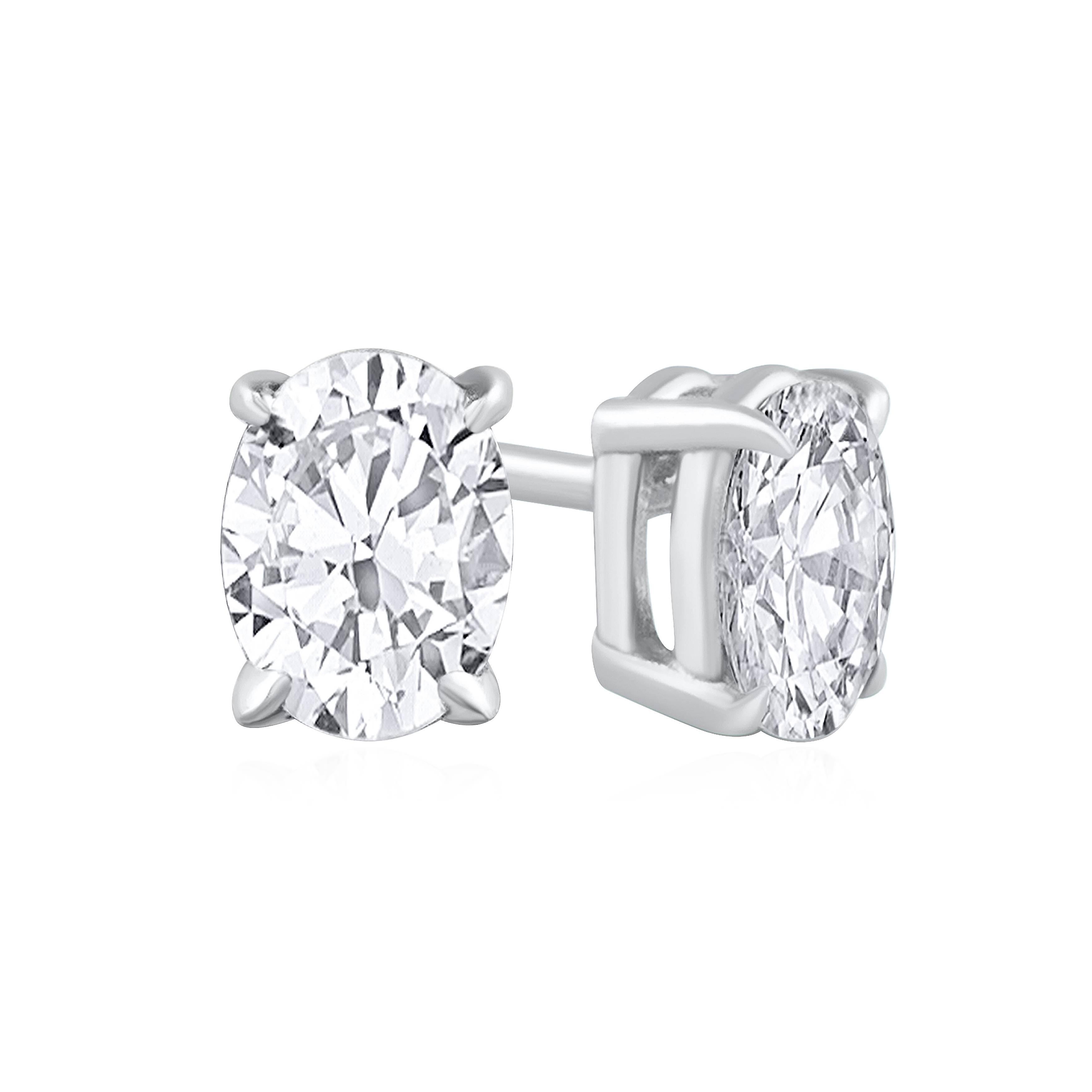 0.60 Carat Total Oval Cut Diamond Stud Earrings