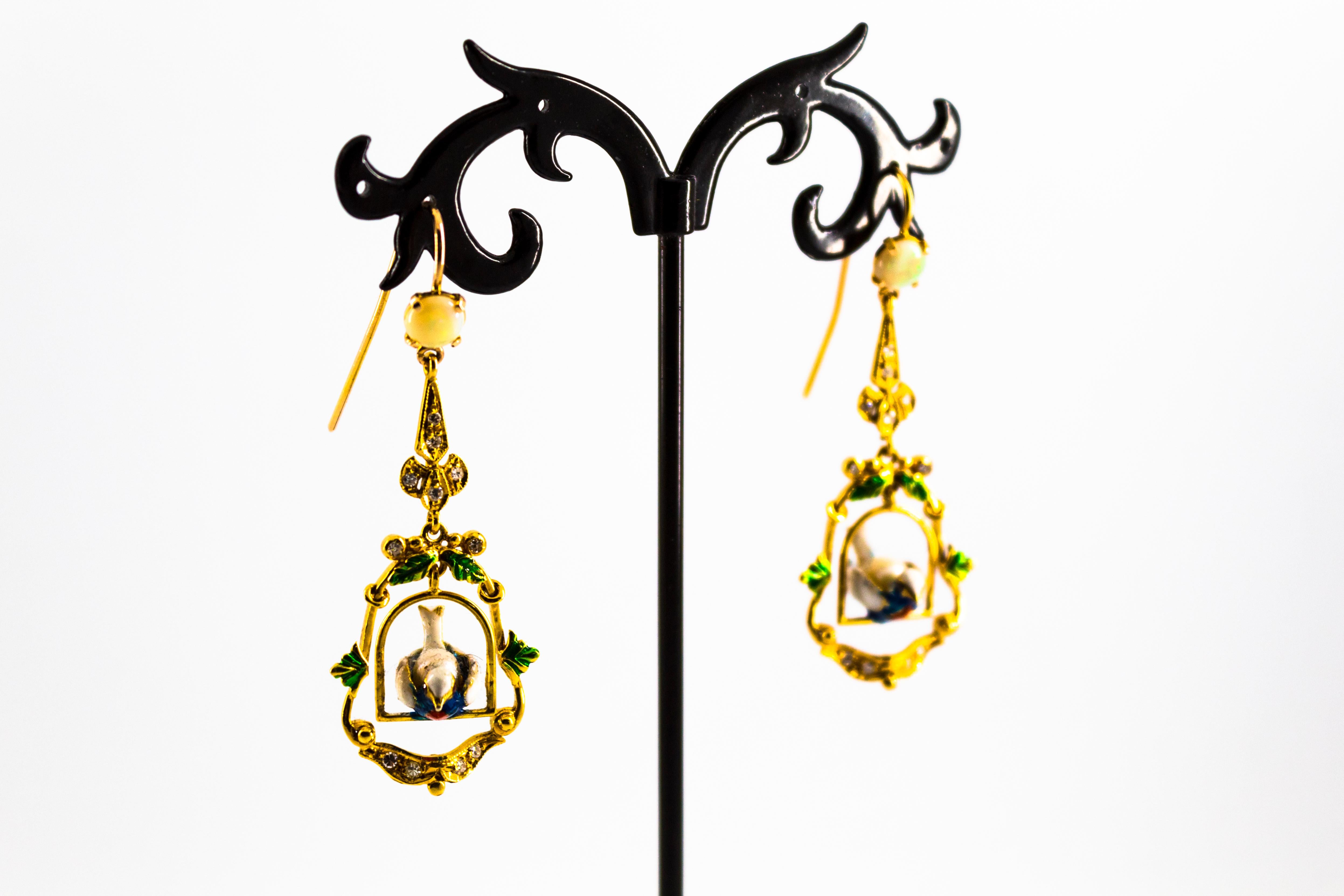 These Stud Drop Earrings are made of 14K Yellow Gold.
These Earrings have 0.60 Carats of White Diamonds.
These Earrings have 1.30 Carats of Opals.
These Earrings have also Enamel and two Pearls on the Birds.

All our Earrings have pins for pierced