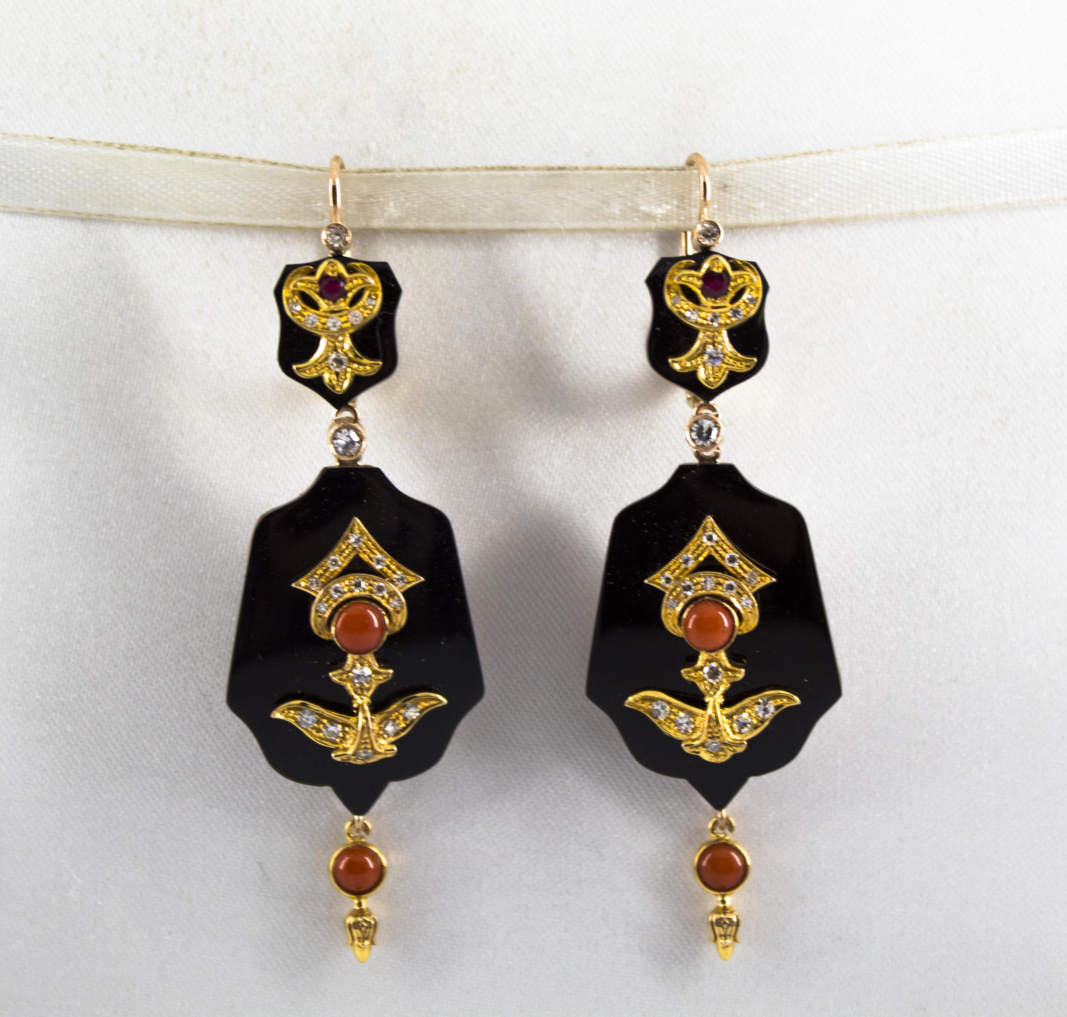These Earrings are made of 14K Yellow Gold.
These Earrings have 0.60 Carats of White Diamonds.
These Earrings have 0.15 Carats of Rubies.
These Earrings have also Onyx, Red Coral.
All our Earrings have pins for pierced ears but we can change the