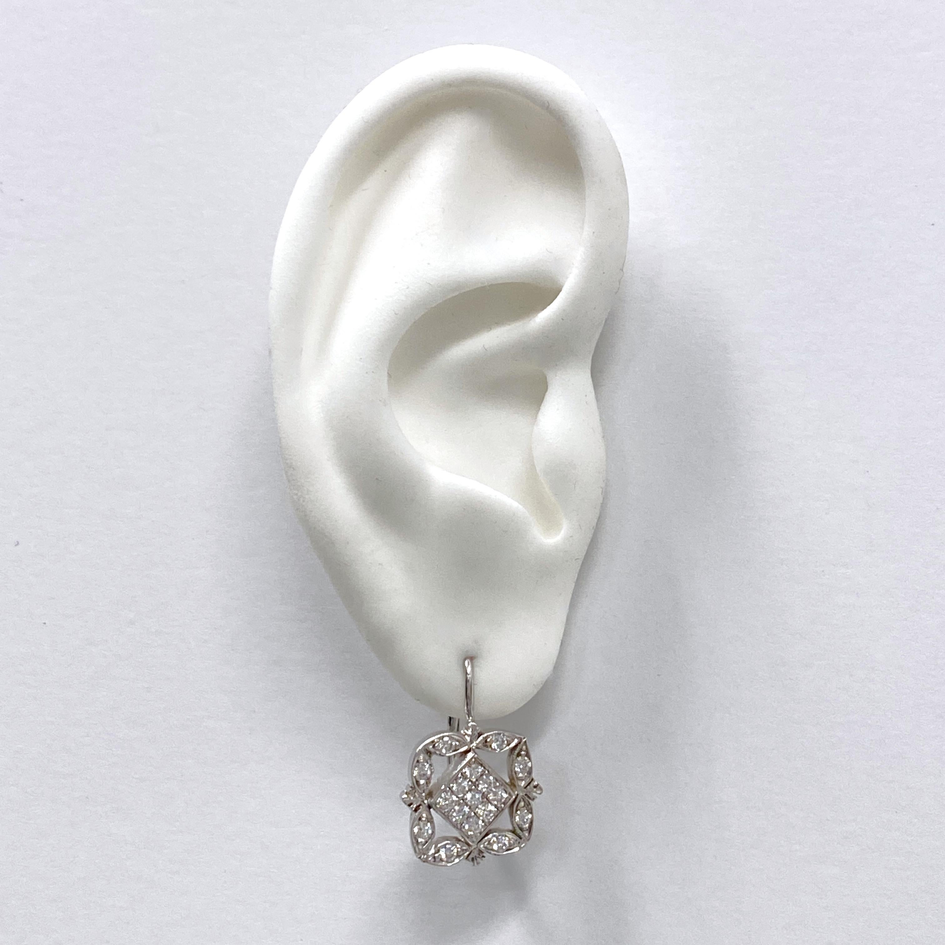 These snappy leverback earrings by Eytan Brandes have the look of Edwardian drops, but they're set with bright-white modern cut diamonds, so they're much sparklier than anything from that earlier period (when gemcutting technology couldn't yet