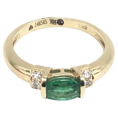 Anello Zambia da 0,60 carati naturali con 0,11 carati di diamanti in oro 14k