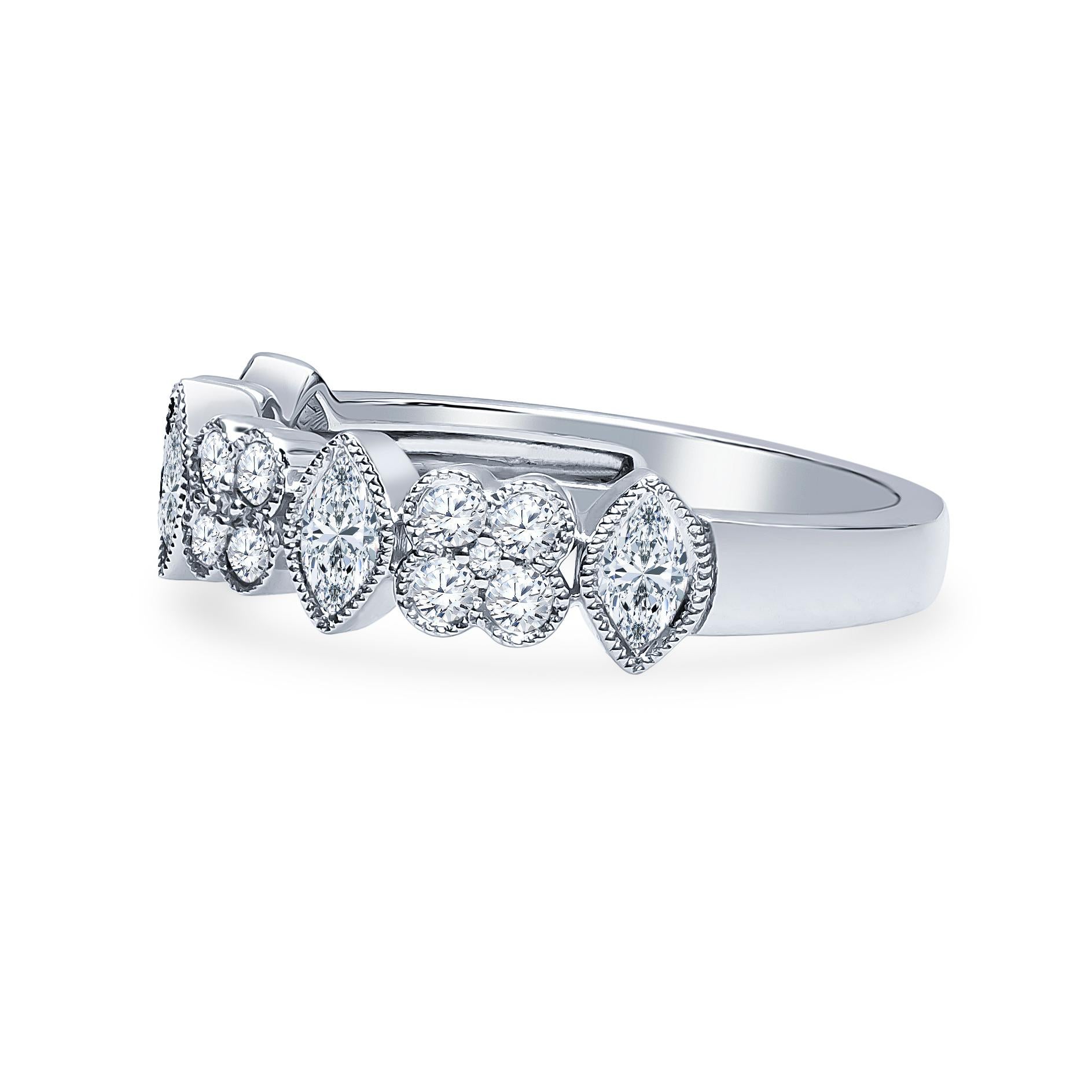 Beautiful women's band with a combination of 0.37 carats of marquise shape diamonds and 0.30 carats total of round brilliant cut diamonds milgrain and bezel set in 18K white gold. Size 6.5, may be resized to larger or smaller upon request.