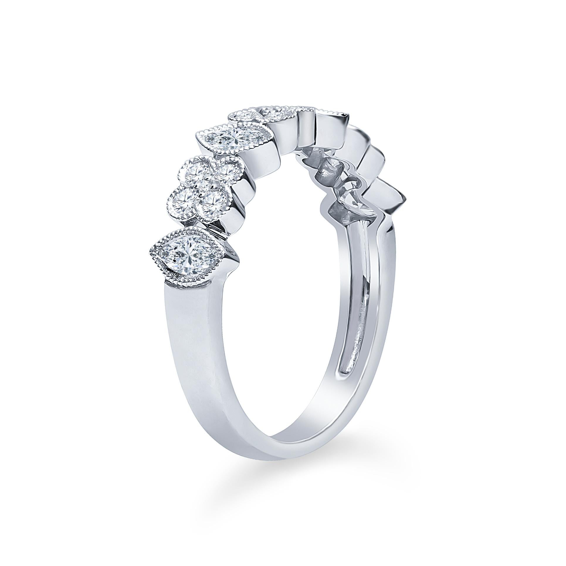 Marquise Cut 0.60 Carats Total Weight of Marquise and Round Diamond in an 18K Wedding Band