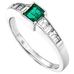 0.60 Ct Natural Emerald and 0.43 Ct Natural White Diamonds Ring