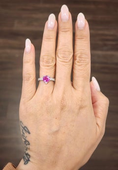 0.60 ct Natural Pink Sapphire & Diamond Ring set in 18k WG