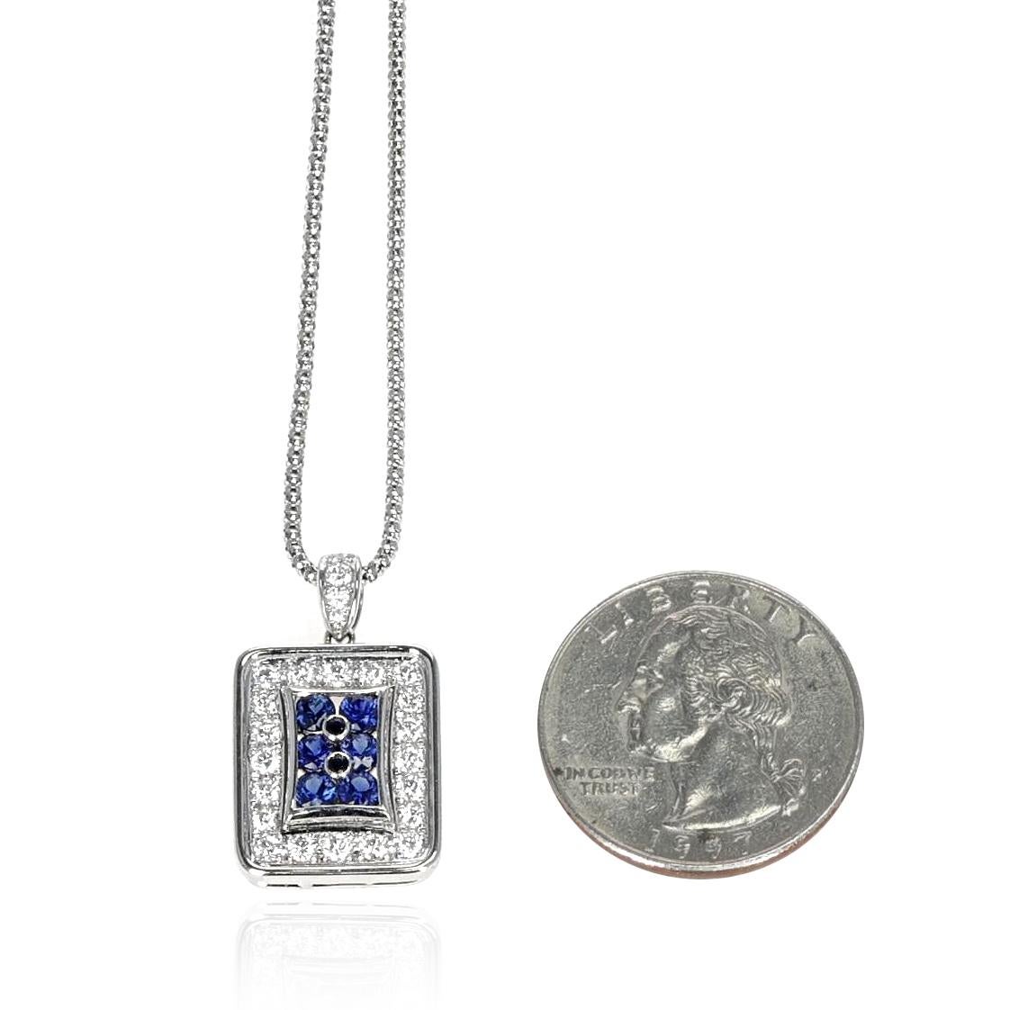 A Round Sapphire and Diamond Rectangular Pendant with Chain made in Platinum. The total weight of the sapphire is 0.60 carats and the total weight of the diamonds is 0.88 carats. The total weight of the pendant necklace is 10.72 grams. 