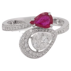 0.60 Pear shape Ruby with Diamond Ring in 18 Karat Gold