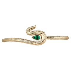 Bracelet manchette de qualité 18 carats avec finition émeraude taille poire foncée de 0,60 carat
