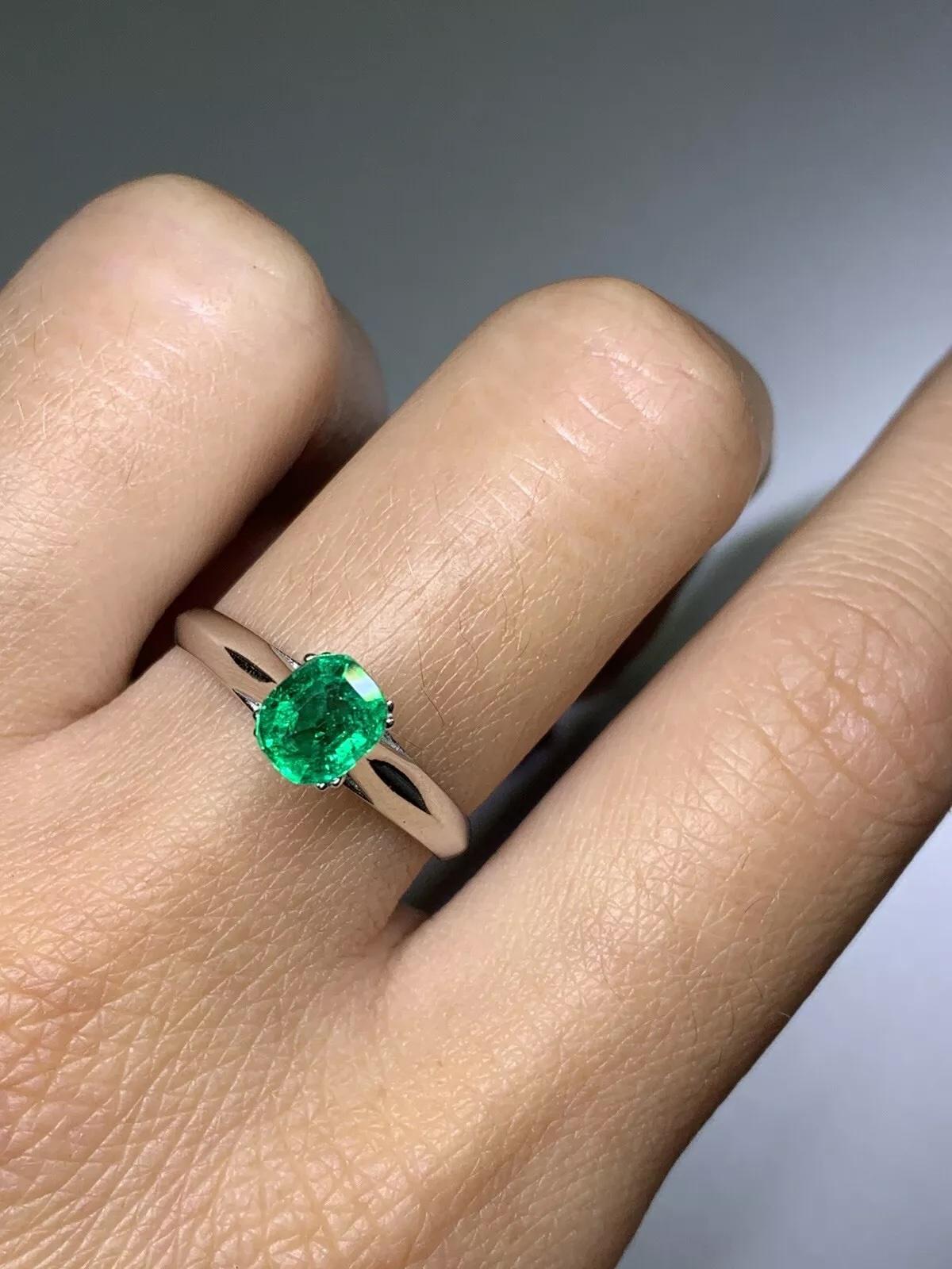 Emerald Cut 0.60ct Colombian green emerald engagement ring 18ct white gold. For Sale