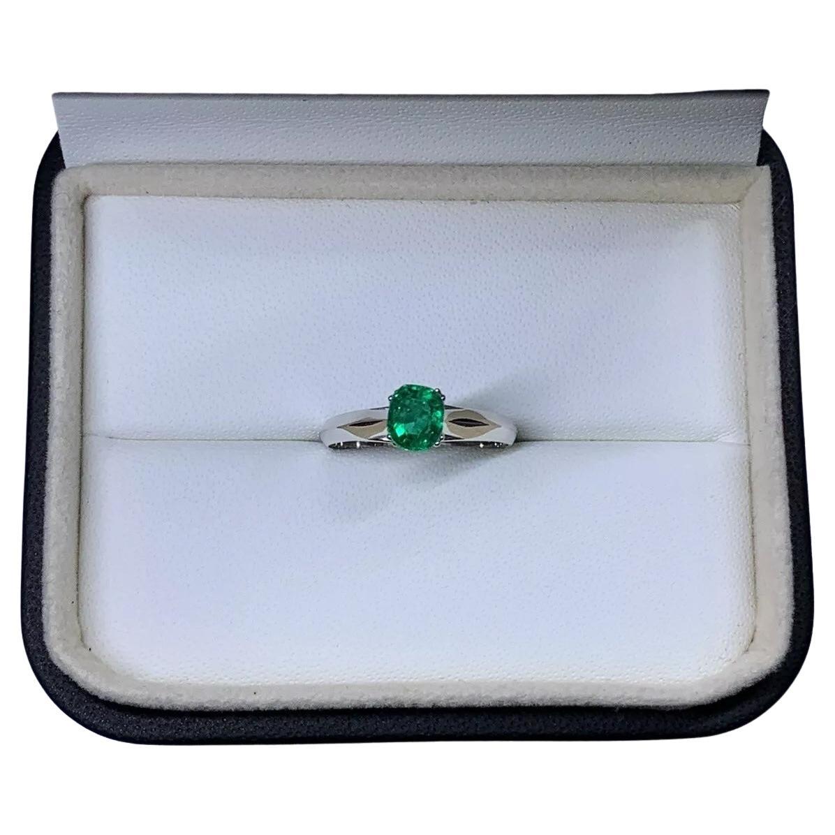 0.60ct Colombian green emerald engagement ring 18ct white gold. For Sale