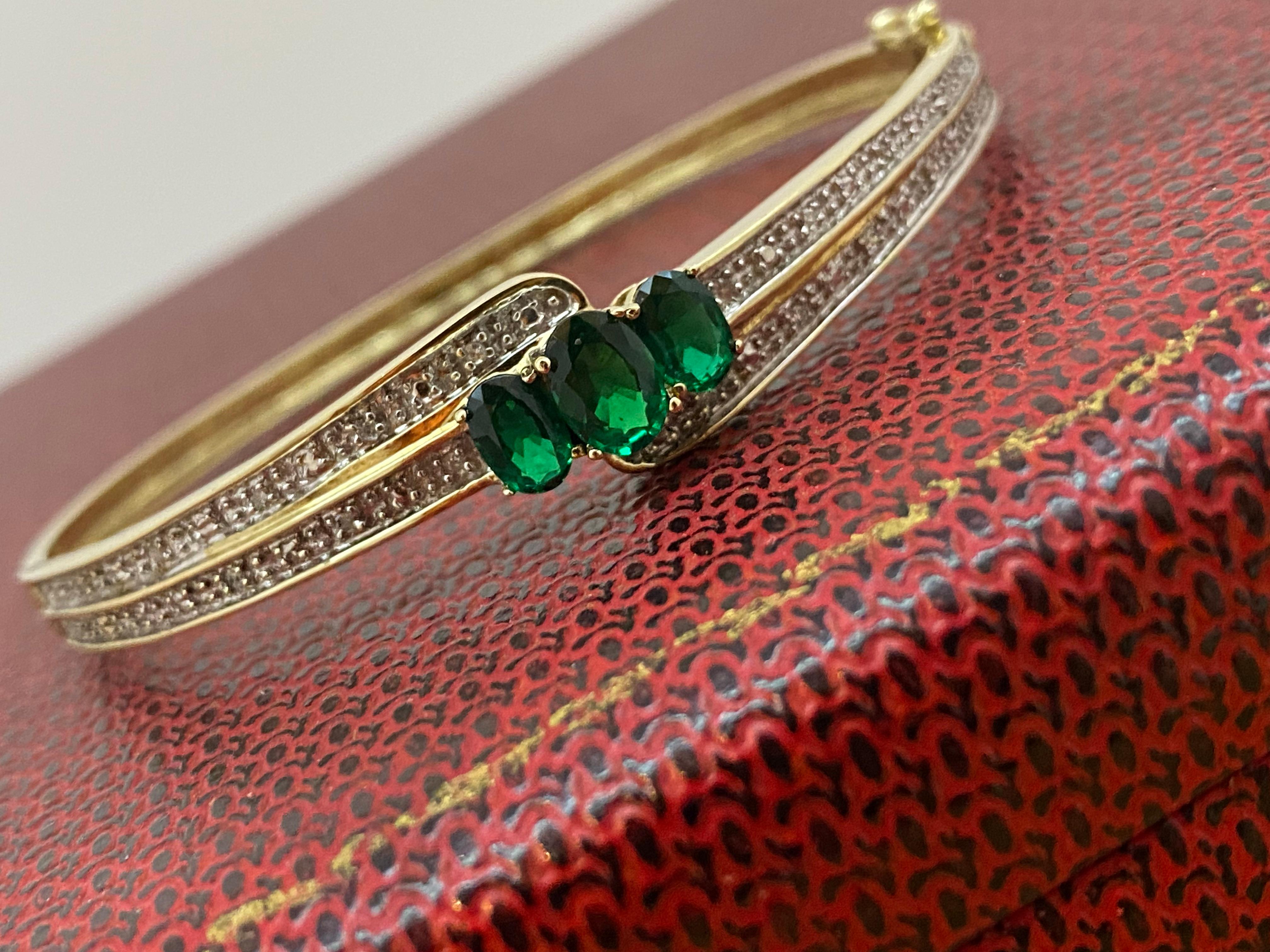 0.60ct Diamond, 2.00ct Gilson Emerald, 9K Yellow Gold Vintage Bangle, 19cm -7.5