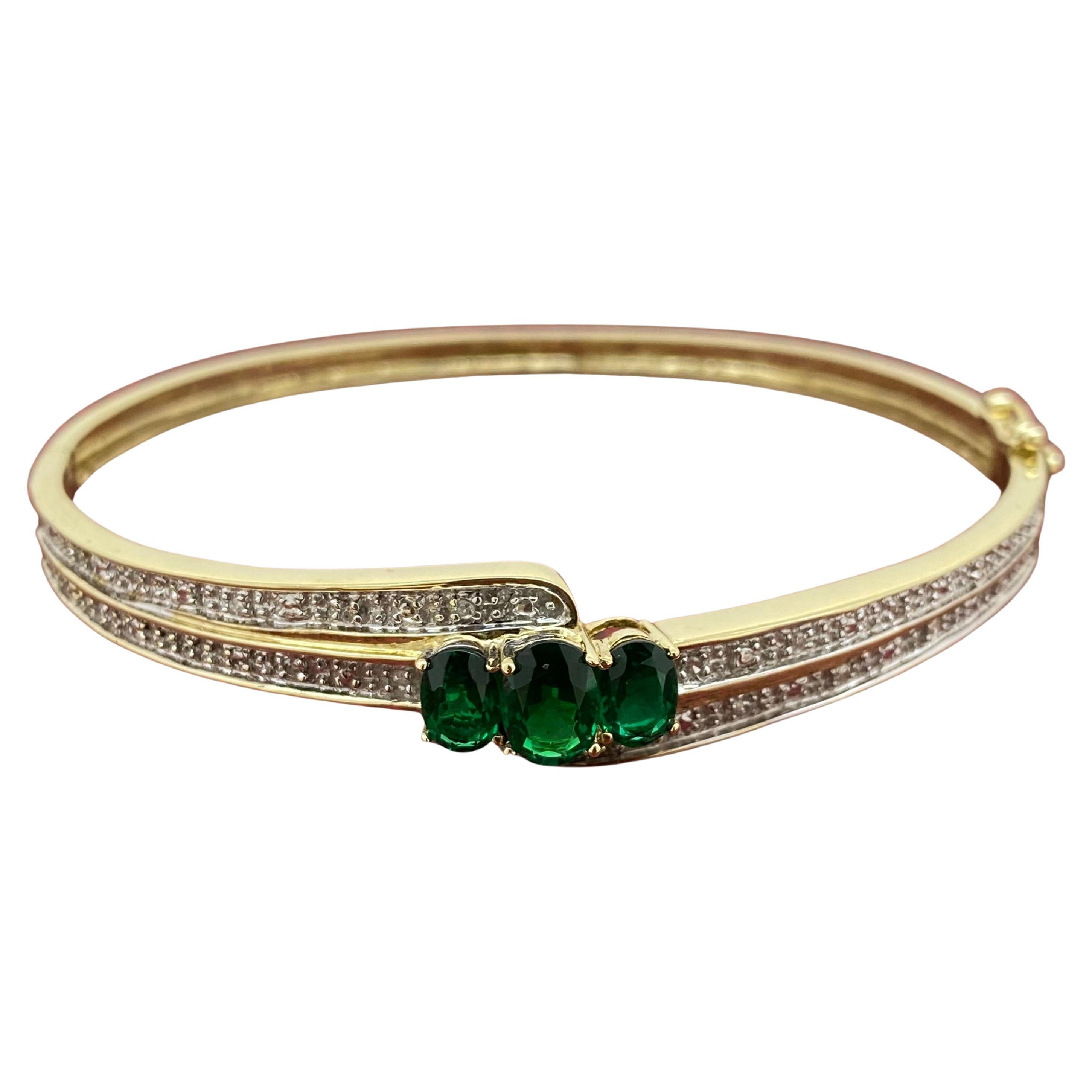 Oval Cut 0.60ct Diamond, 2.00ct Gilson Emerald, 9K Yellow Gold Vintage Bangle, 19cm -7.5