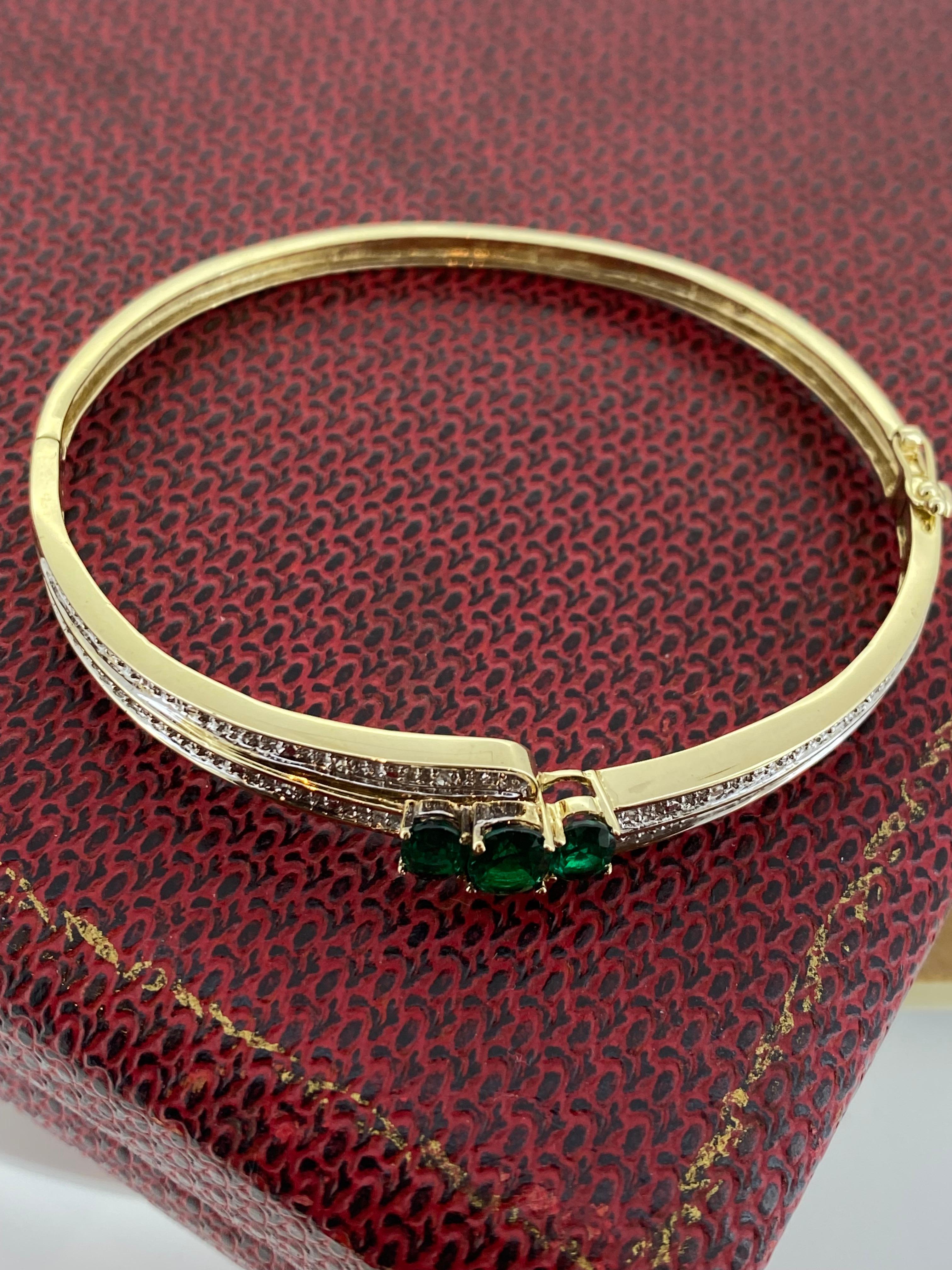 0.60ct Diamond, 2.00ct Gilson Emerald, 9K Yellow Gold Vintage Bangle, 19cm -7.5