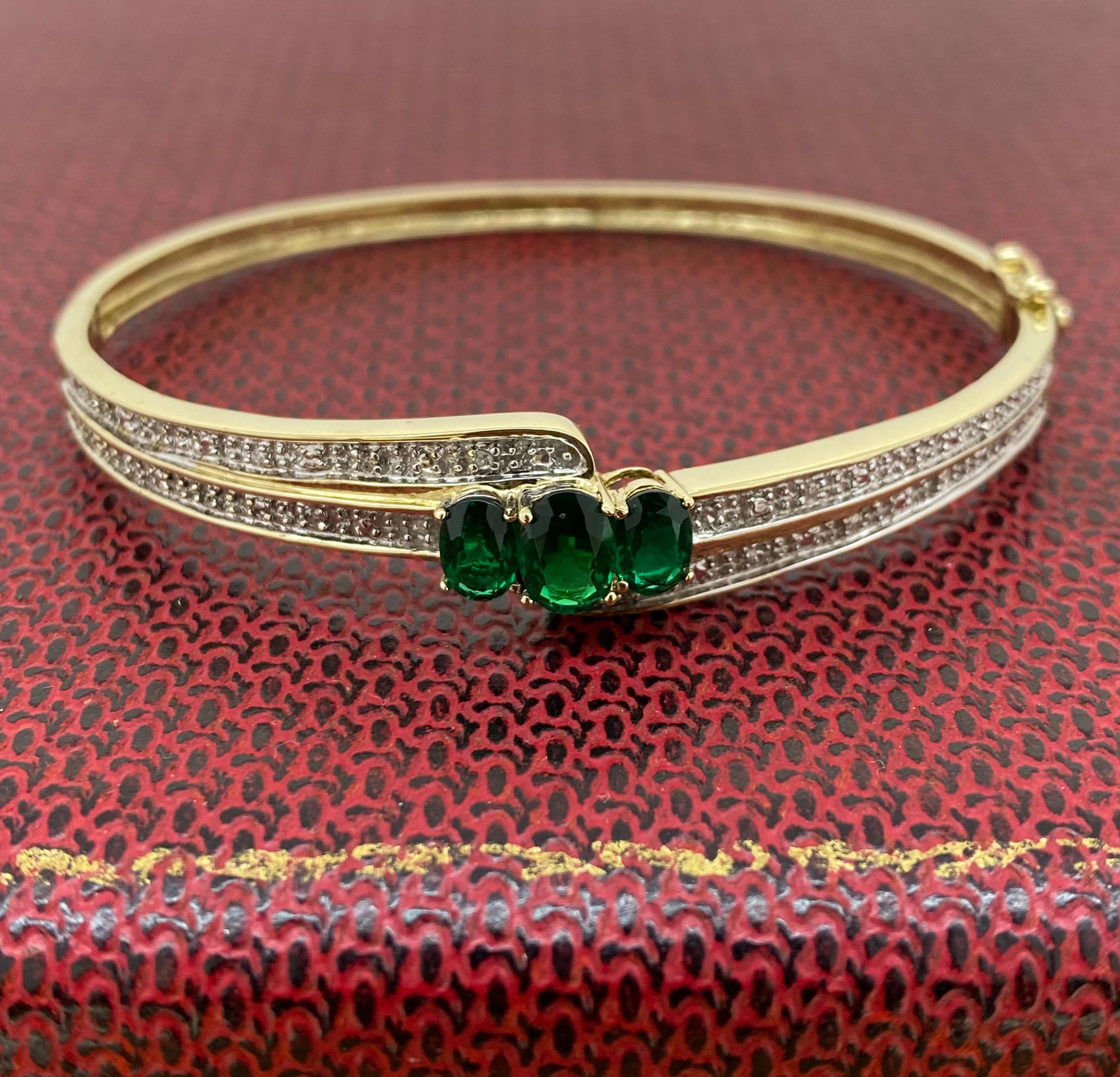 0.60ct Diamond, 2.00ct Gilson Emerald, 9K Yellow Gold Vintage Bangle, 19cm -7.5
