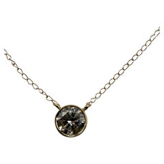 0.60ct Diamond bezel set pendlace 14KT gold 18" chain