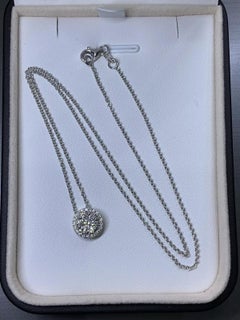 0.60ct Diamond halo pendant necklace invisible in 18k white gold.
