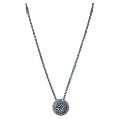 Collar con halo de diamantes de 0,60 ct invisible en oro blanco de 18 quilates.