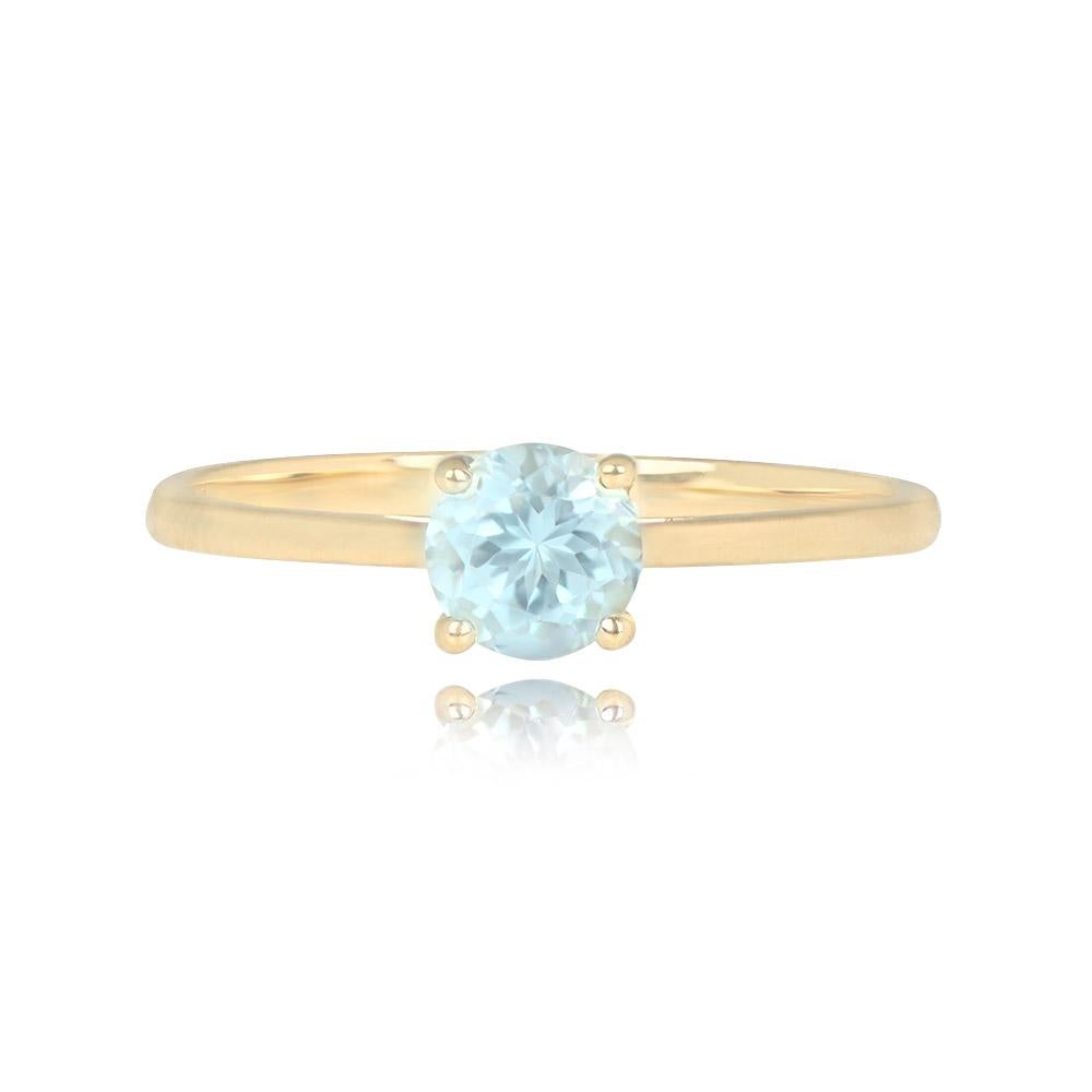 A solitaire engagement ring with a round 0.60-carat aquamarine held in prong settings. The ring is meticulously handcrafted in 18k yellow gold.


Ring Size: 6.75 US, Resizable 
Metal: Gold, Yellow Gold
Stone: Aquamarine
Stone Cut: Round Cut
Style: