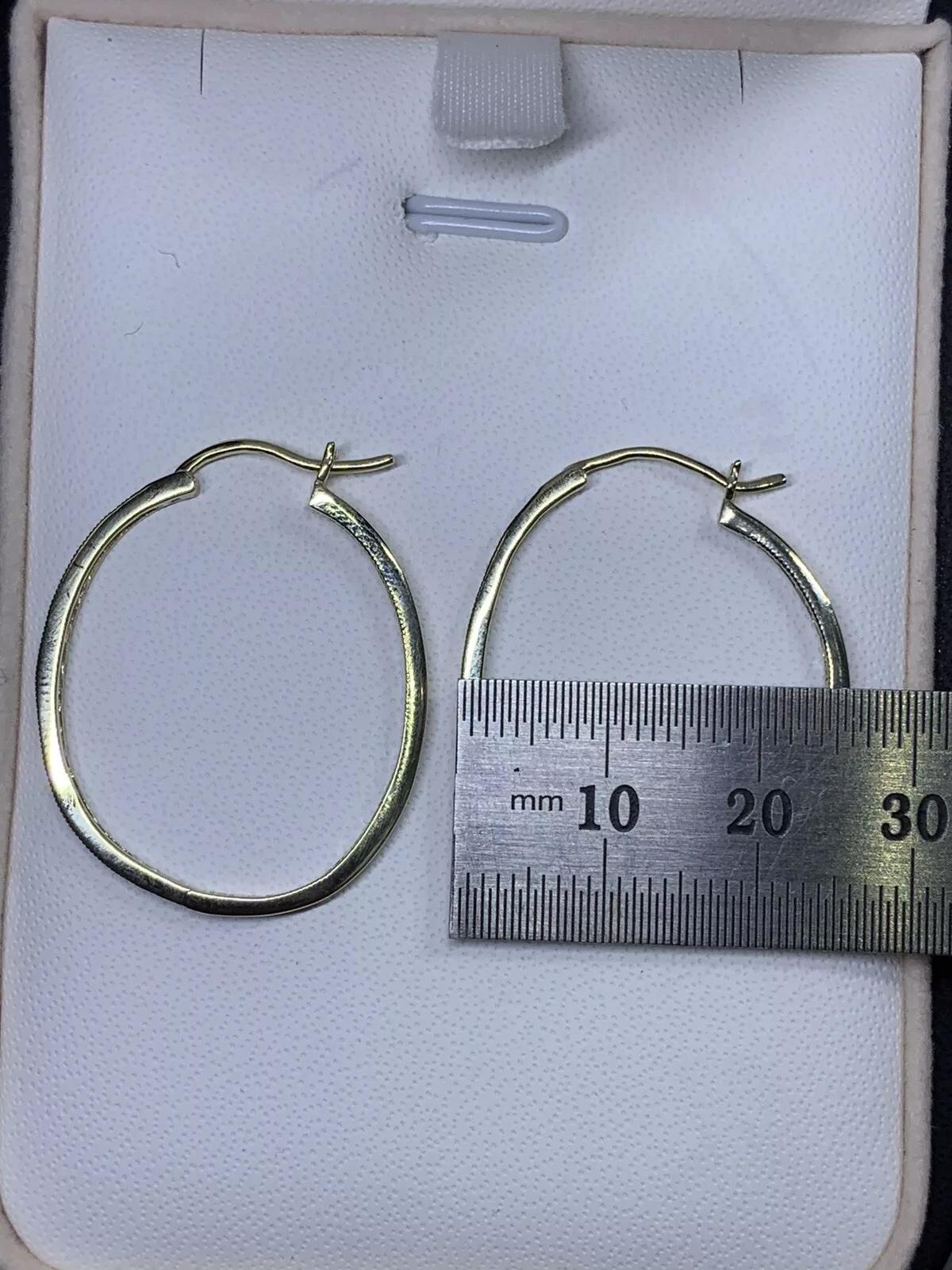 0.60ct Round diamond chunky hoops huggies earrings in 9ct yellow gold. In New Condition For Sale In London, GB