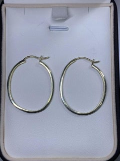 0.60ct Round diamond chunky hoops huggies earrings in 9ct yellow gold.