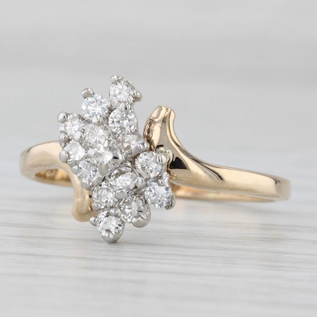 Anello bypass con cluster di diamanti da 0,60 carati in oro giallo 14k, misura 8,75
