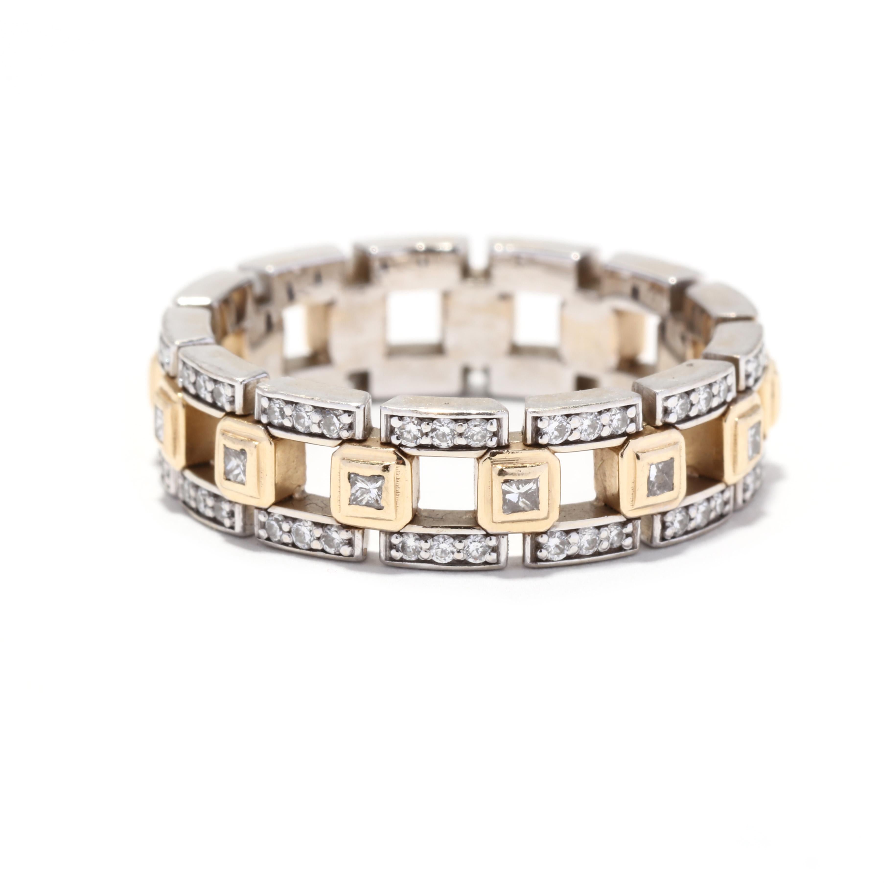 A vintage 14 karat yellow and white gold fancy diamond band. This wide band features spaced, bezel set princess cut diamonds set in yellow gold, connected together with bands of pavé set full cut round diamonds set in white gold and in an eternity