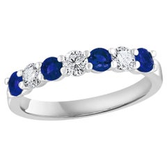 Bague avec diamants ronds naturels de 0,60 carat et saphirs bleus ronds naturels de 0,55 carat 